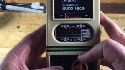 Sears_Electronic_Auto_Race__vintage_1970s_handheld_LED_gam.gif