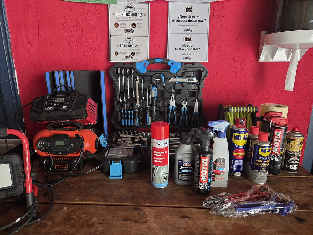 Motorcycle maintenance equipment and tools in the service area at Hotel moto-rural VEGALION