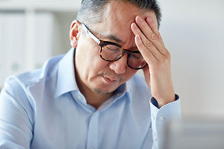 business, overwork, stress, deadline and people concept - close up of tired businessman in