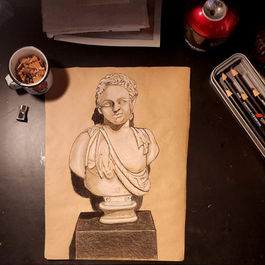 A sketch of a bust in a museum done in charcoal