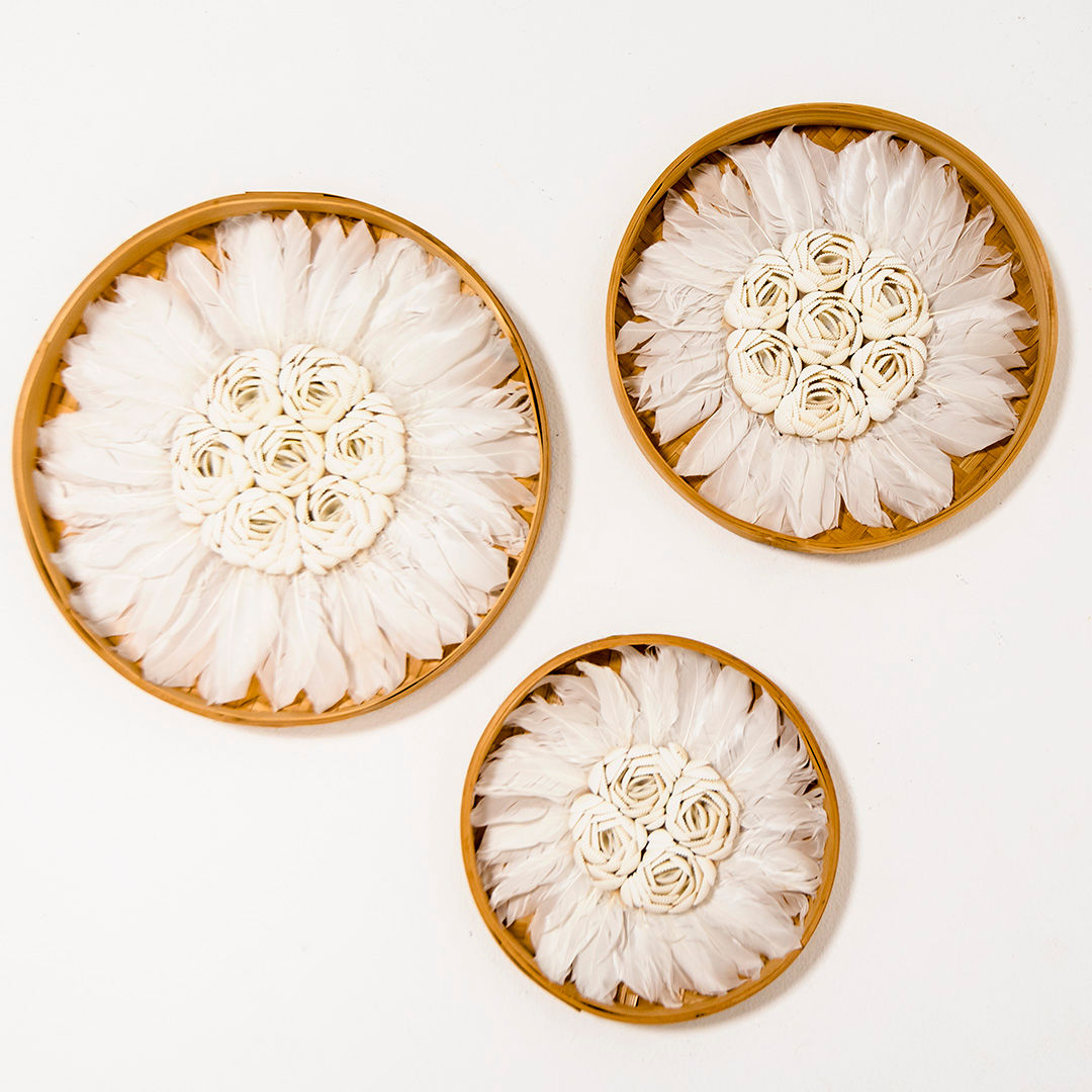 DALA 5 - White bird feathers on bamboo plate.