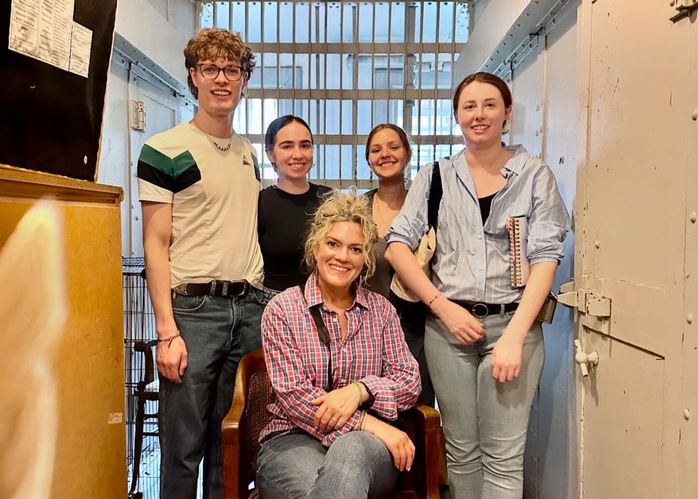 Preservation Forward was hired by the City of Big Rapids to assess the current conditions of the Mecosta County Jail. Seated is Jessica Flores, Owner of Preservation Forward with (left to right): Jordan Wing, MSU student, Brittany Selzer, MSU student. Lauren Reiss, MSU Student, and Rebecca Murphy, historic preservation specialist with Preservation Forward.