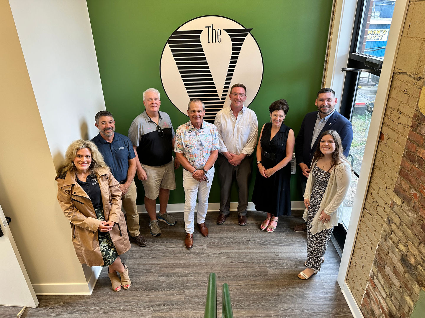 The redevelopment team for the Vermeulen Building located at 116-120 E Superior Street in Downtown Alma.