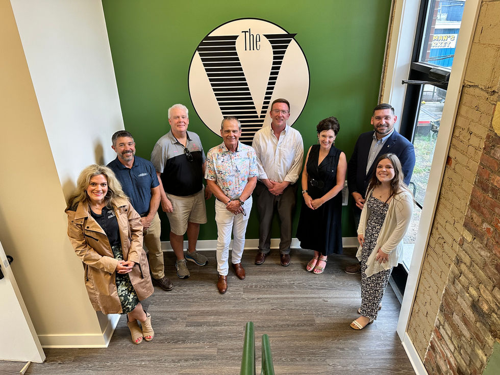 The redevelopment team for the Vermeulen Building located at 116-120 E Superior Street in Downtown Alma.