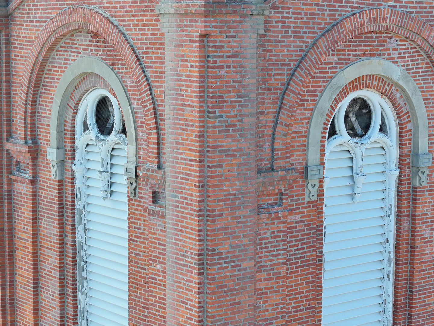 Built between 1866 and 1869 under contractor John C. Bennett at a cost of $40,104, this Romanesque Revival church has been a cornerstone of Branch County for over 150 years. At the time of its completion, it boasted the largest seating capacity of any building in Coldwater, regularly serving as a public auditorium for the community. Its stage welcomed some of history's most influential voices, including Sojourner Truth in 1877 and Elizabeth Cady Stanton.
The building itself is a striking example of 19th-century ecclesiastical architecture — red brick construction with a gable roof, a projecting centrally aligned tower, and a sandstone belt course separating the basement from the sanctuary. Rising 185 feet above downtown, the steeple is one of the tallest in southern Michigan and an unmistakable feature of the Coldwater skyline.
Preservation Forward identified key structural and architectural concerns during a condition assessment of the bell tower and steeple at First Presbyterian Church and are ready to deliver their recommendations.