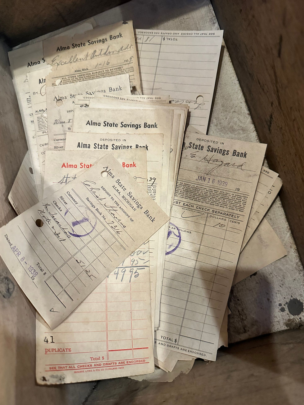 Deposit slips from the Alma State Savings Bank circa 1930s.