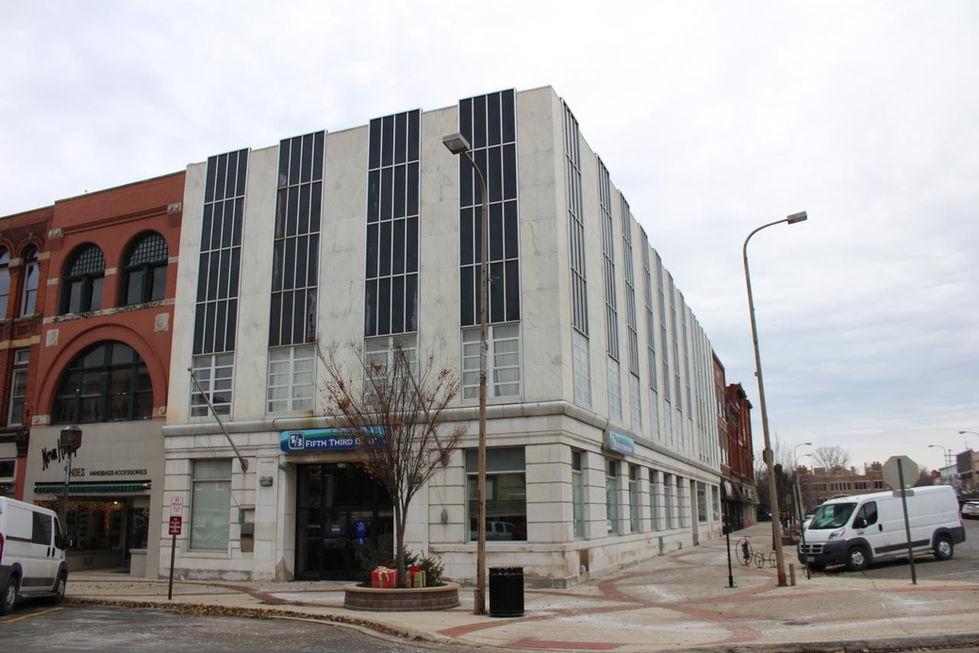 The Owosso Bank and Savings Building, circa 1895, is located at 123 N. Washington Street in Downtown Owosso and is ripe for redevelopment! This photo was taken in January 2021 with secondary facade materials intact.