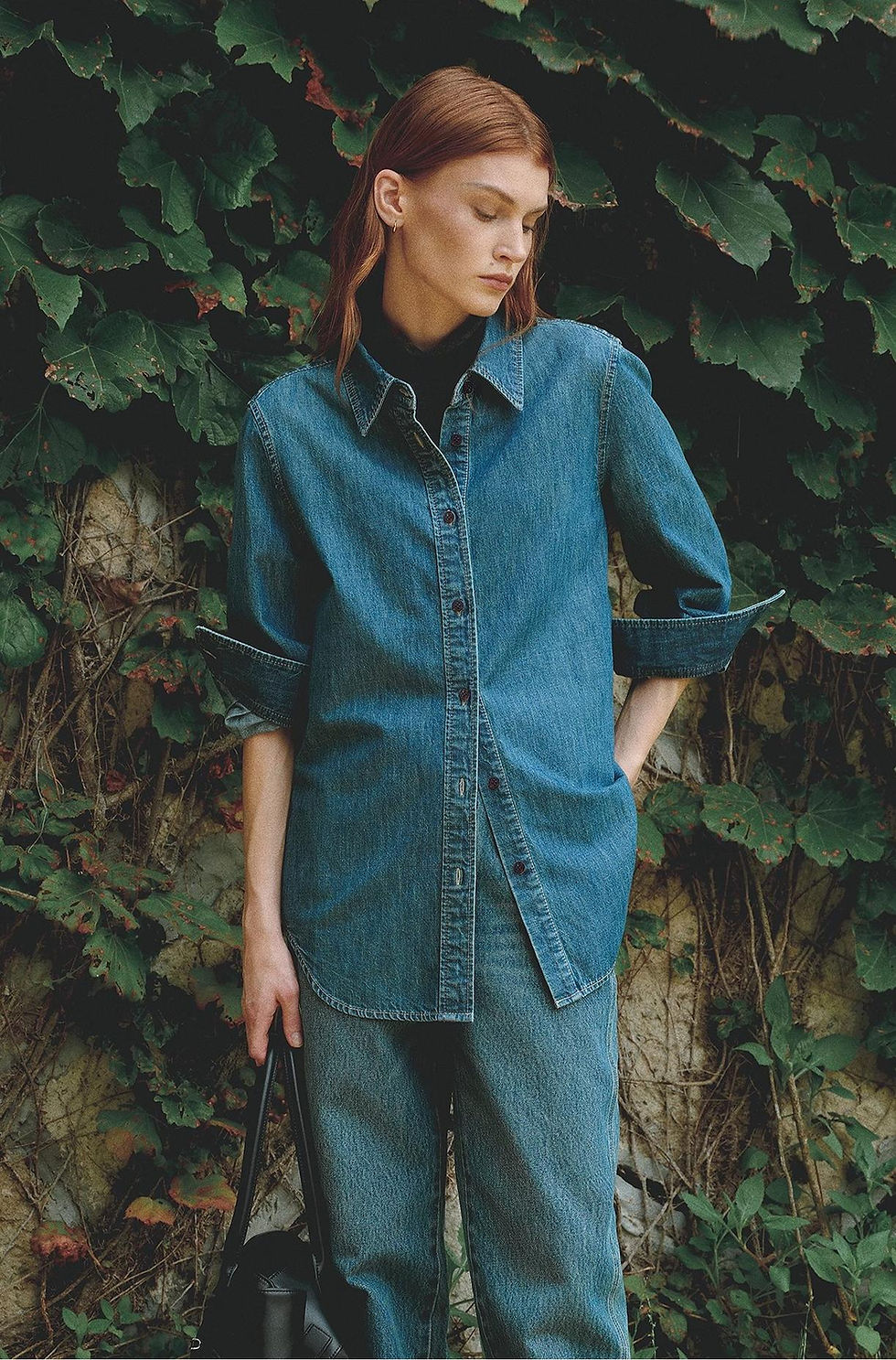 Woman wearing the BERTO Denim Classic Lapel Shirt in blue
