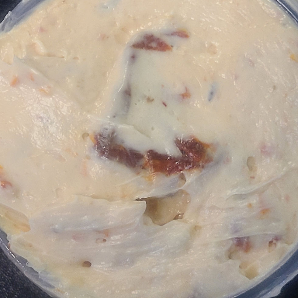 Thumbnail: Sundried tomato cream cheese close up