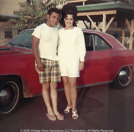 Circa 1969 couple in front of a car