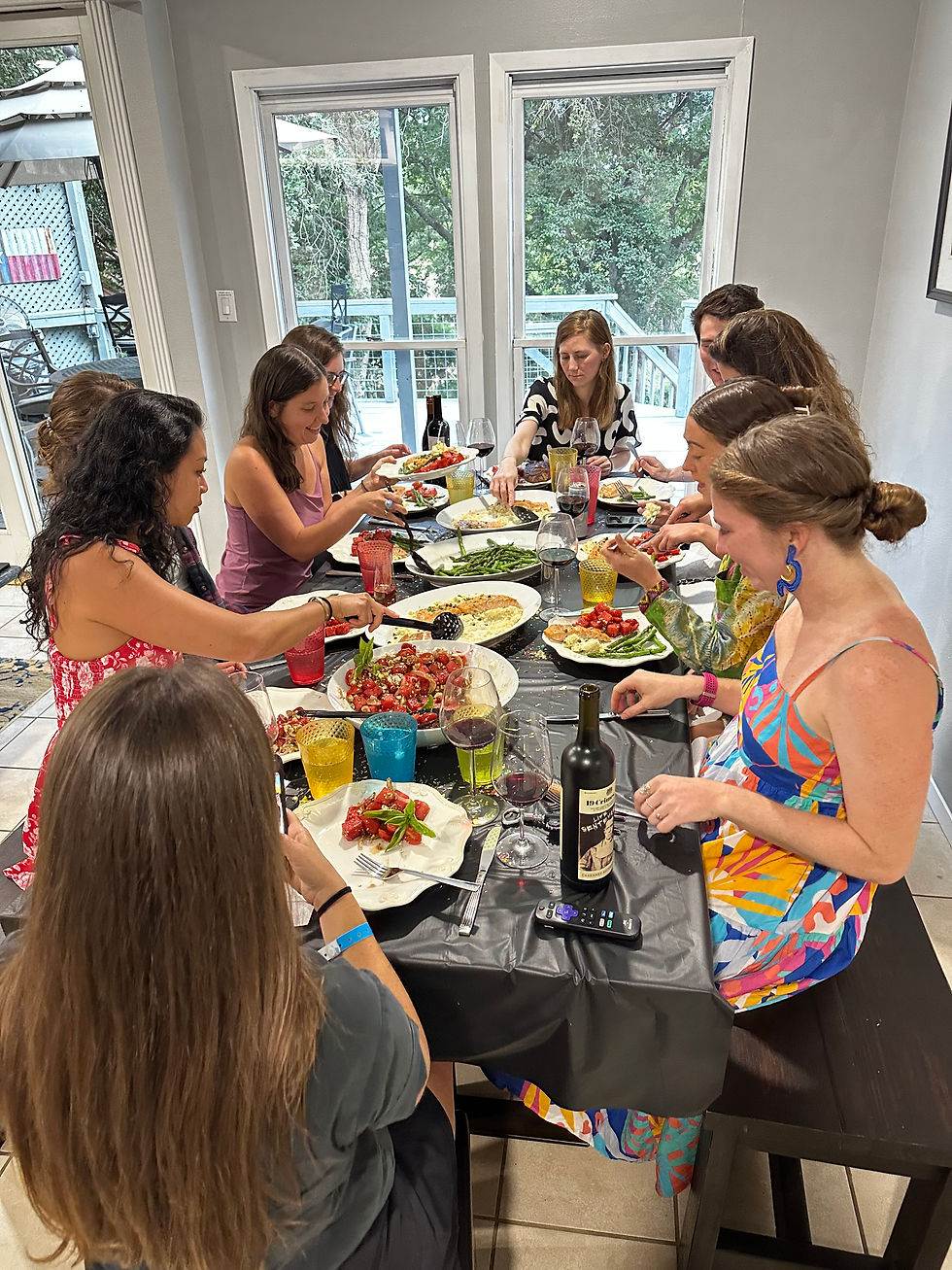 Eye-level view of a beautifully set dining table with elegant place settings