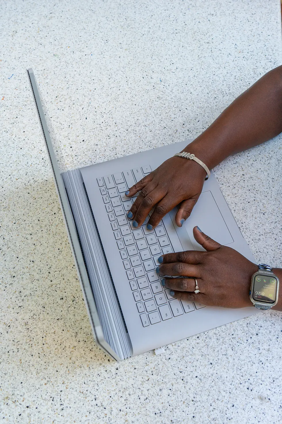 JoKeitha Seabrook typing on laptop computer