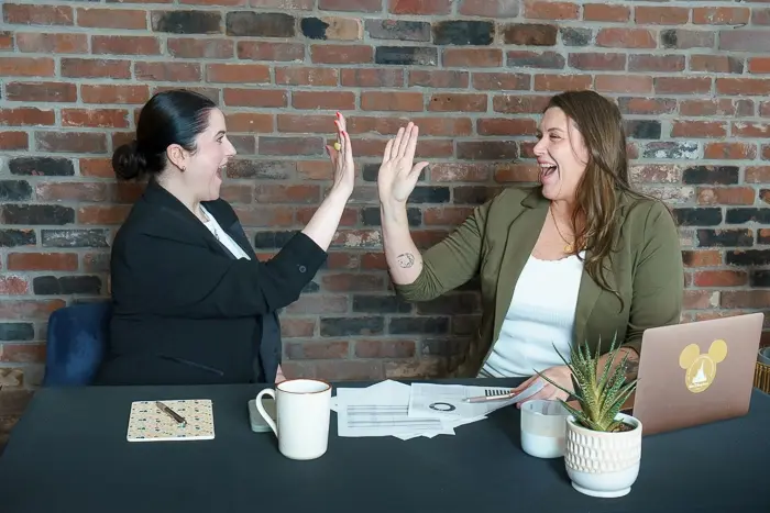 Kelly Goode consulting with a client