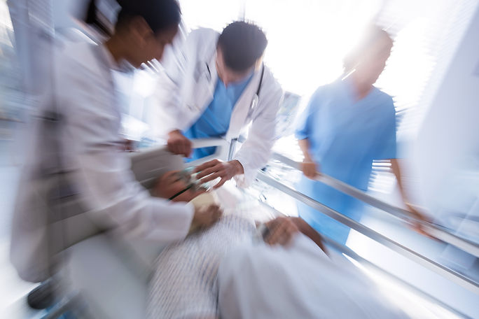 team-doctors-putting-oxygen-mask-male-senior-patient-face.jpg