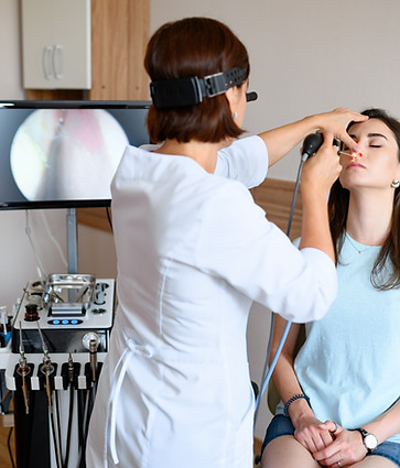 female-otolaryngologist-patient-office-exam-nose-examination-clinic-professional-diagnosti