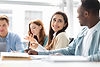smiling-young-adults-collaborating-at-an-office-2026-01-08-23-14-15-utc.jpg