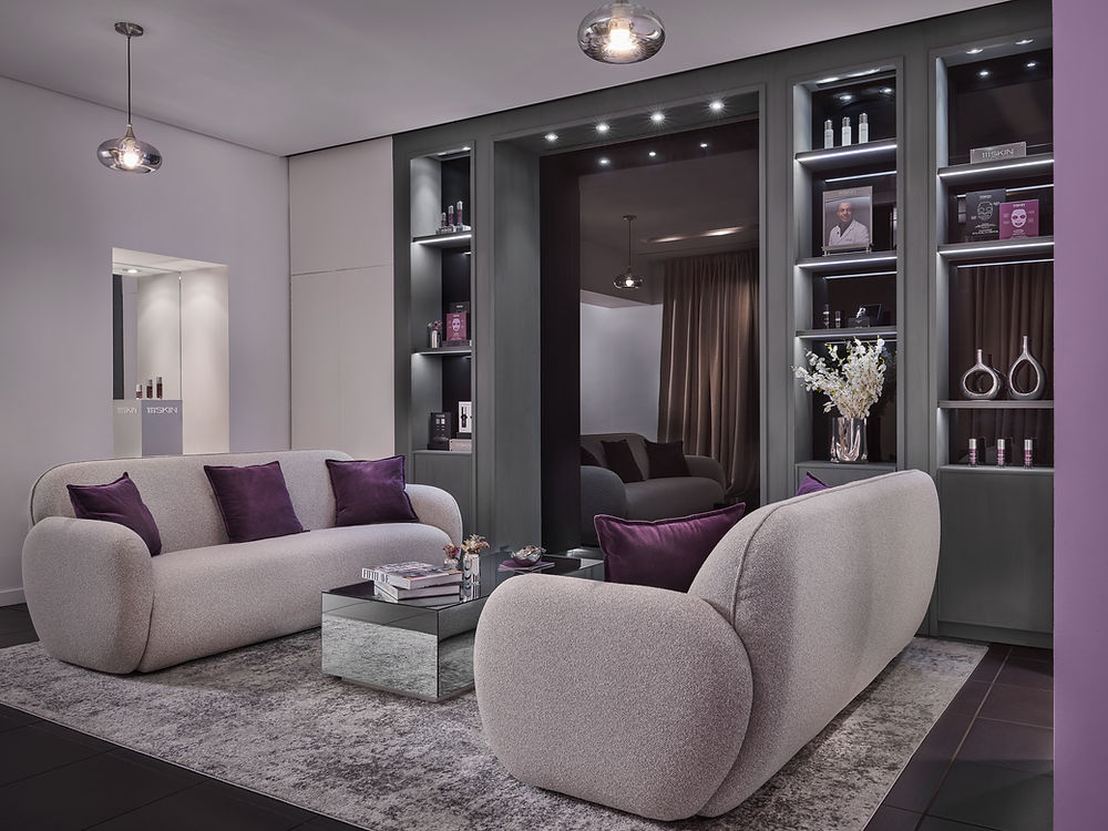 Elegant 111 Skin Plaza Hotel lounge with sofas and products