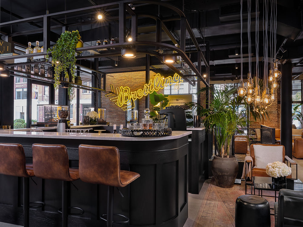 Breitling cafe interior with neon sign, bar stools