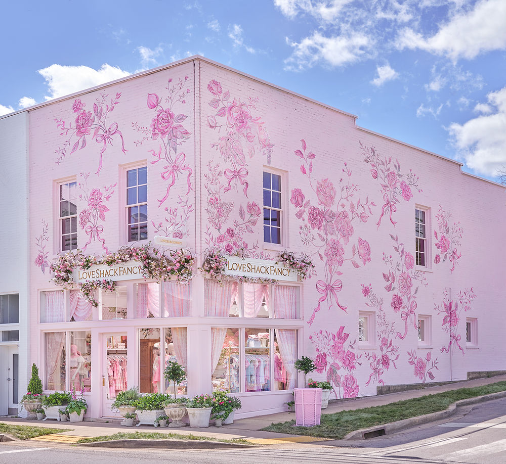 Pink building with floral mural, Love Shack Fancy store