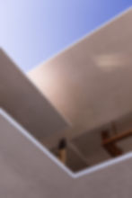 Modern architectural angles against a blue sky