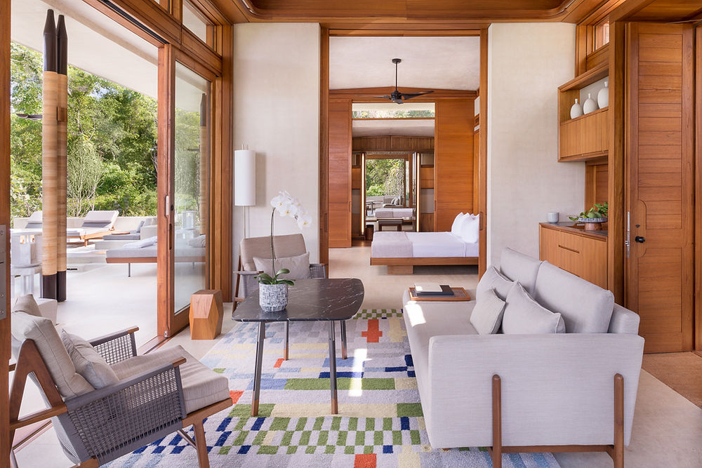 Amanera resort suite with living room and outdoor patio