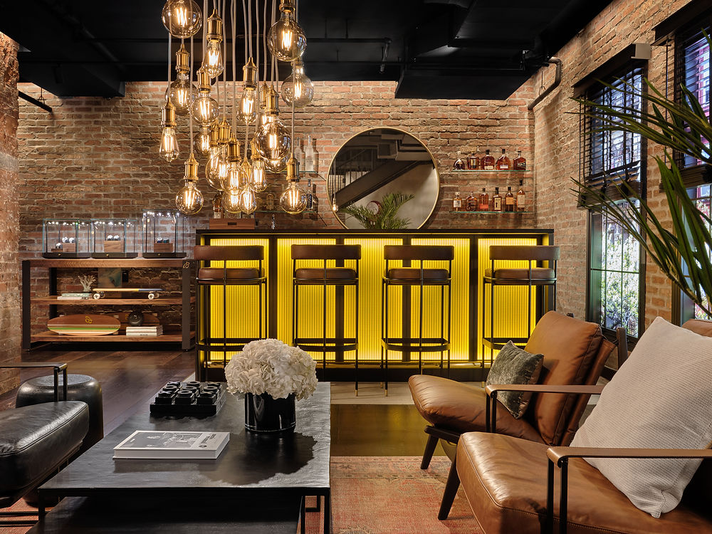Industrial bar with brick, unique lighting, leather seats
