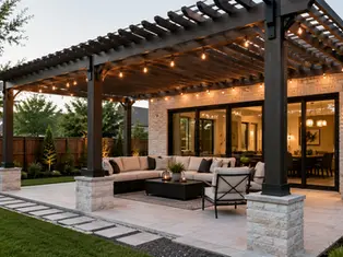 Custom pergola installed over a modern backyard patio in Texas