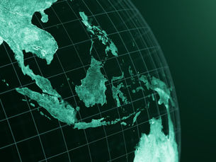 Green-toned globe showing Southeast Asia with grid lines, focused on Indonesia, against a dark green background. No text visible.