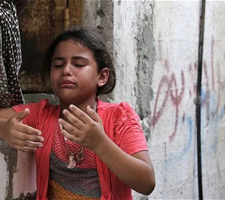 A Palestinian child, the unseen casualty amidst the ruins of war. | Part of the series “The Innocent Victims of War”
