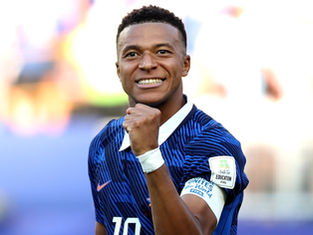 France Outlasts Stubborn Paraguay to Advance