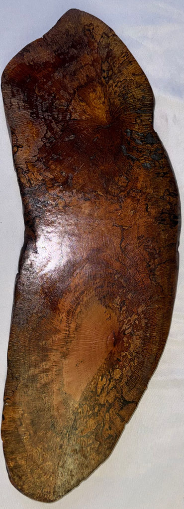 One-of-a-kind wood serving board with detailed grain