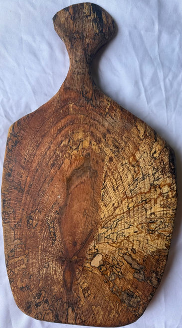 Handmade live edge serving board crafted from natural wood