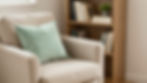 Beige armchair with teal pillow next to a bookshelf
