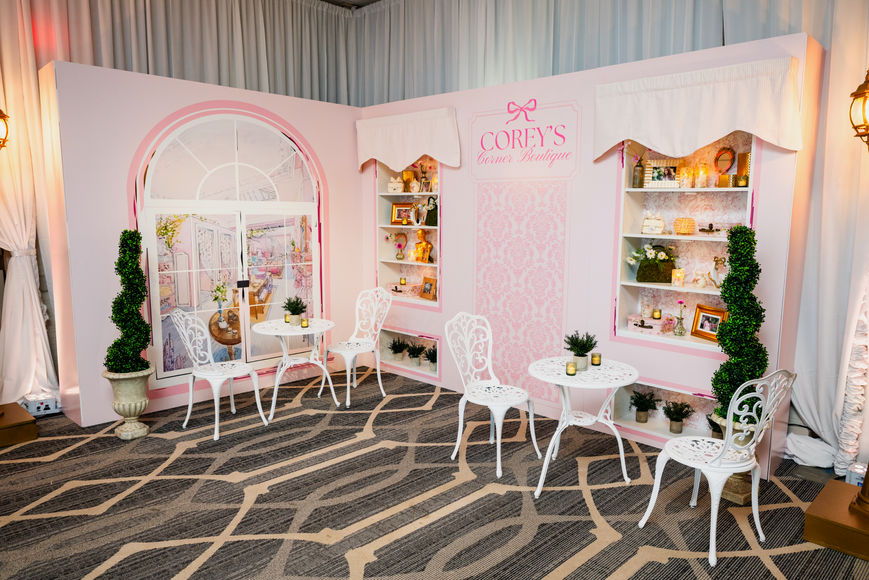 Custom fabrication and installation seating vignette featuring branded furnishings, custom signage, coordinated styling, and an immersive themed environment.