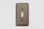 Oil rub bronze round corner toggle switch plate on white background