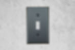 Black stone toggle switch plate on white background