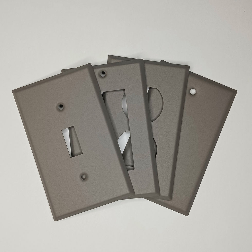 4 Gray switch plates on white background