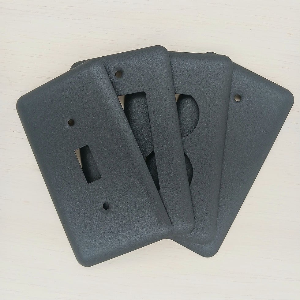 4 charcoal Gray round corner switch plates on white background