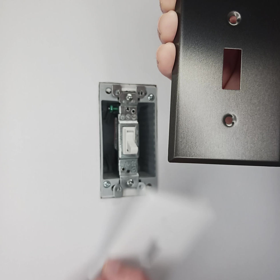 Thumbnail: Video showing black stainless switch plate being installed