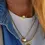 Miniatura: Collana satellite