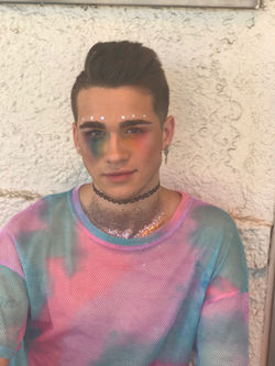 rainbow bleeding down face w/ face stickers