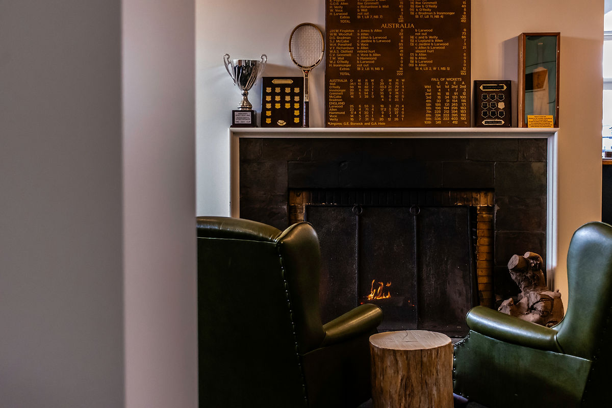 Chairs in front of a fireplace