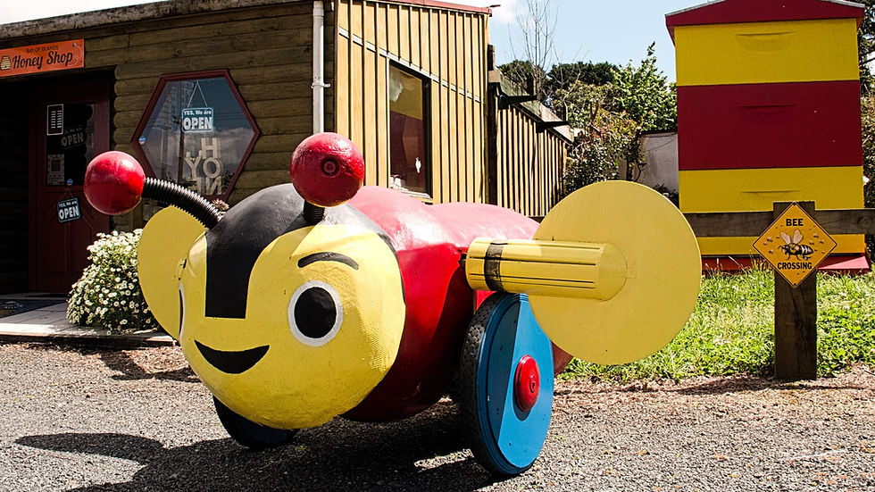 Giant Buzzy Bee — bright red nose, cheerful yellow face, oversized spinning wings, and all. It is one of the most photographed landmarks in Kerikeri,