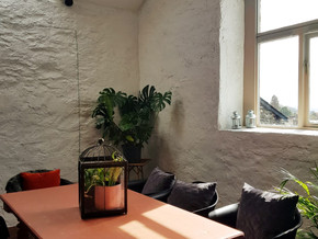 Our big table for 8 in the back window can be prebooked for parties of 6-8.