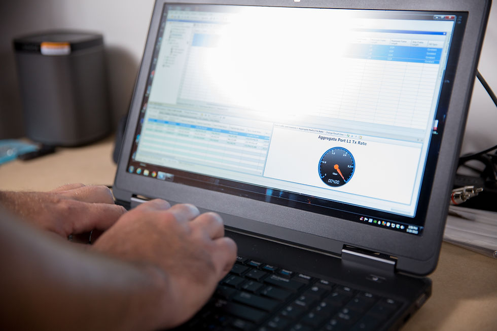 hands typing on open laptop wifi configuration screen