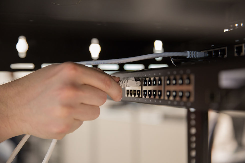 hand connecting wire to wi-fi installation port