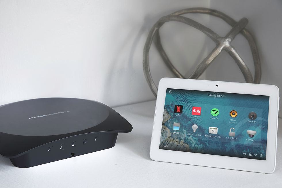 White tablet next to a wifi router