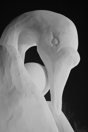 Snow Swan Head—a closeup of a sculpture of a swan's head made from snow