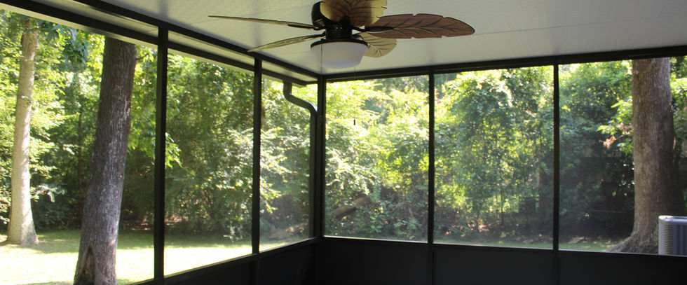 Bronze screen room with backyard view 