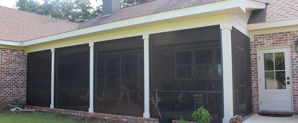 Screen room with brick foundation and white columns